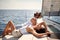 Young couple enjoy on a yacht