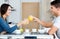 Young Couple Enjoying Breakfast in the kitchen