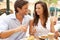 Young Couple Enjoying Coffee And Cake