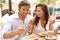 Young Couple Enjoying Coffee And Cake