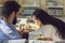 Young couple enjoying fresh healthy takeaway meal they ordered in food delivery service