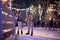 A young couple enjoying learning to skate at ice rink. Skating, closeness, love, together