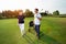 Young couple enjoying time on a golf course