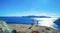 Young couple enjoying the view of Santorini Caldera Greece