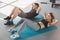 Young couple exercise together in gym healthy lifestyle