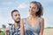 Young couple farmers toasts in their vineyard