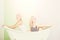 Young couple foreplay lying in tub, intimacy lovers, women