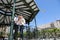 Young couple in gazebo in town