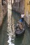 Young couple on a gondola, Venice, Italy