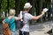 Young couple hailing for public transport