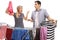 Young couple having an argument while hanging clothes