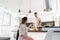 Young Couple Having Breakfast, Asian Woman Hispanic Man Cooking Food Kitchen