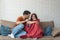 Young couple having conflict and relationship difficulties. Woman and man talking about the future after argue where girlfriend