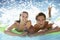 Young Couple Having Fun With Inflatable Airbed Swimming Pool Together