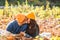 Young couple having fun together in autumn. Love. Fashionable couple enjoying autumn. First kiss