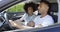 Young couple having a serious talk in a car