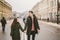 Young couple, heterosexual boy and girl of Caucasian nationality, loving couple, walk around the center of country of European