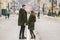 Young couple, heterosexual boy and girl of Caucasian nationality, loving couple, walk around the center of country of European