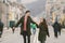 Young couple, heterosexual boy and girl of Caucasian nationality, loving couple, walk around the center of country of European