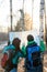 Young couple hikers looking at map.