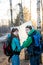 Young couple hikers looking at map.