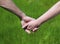 Young couple hold each other\'s hand