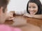 Young Couple Holding Hands On Table