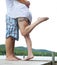 Young couple hugging on dock