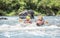 Young couple on an inflatable catamaran