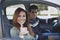 Young couple inside the car