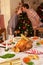 Young couple kissing under mistletoe at Christmas