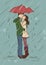 Young couple kissing under an umbrella