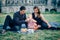 Young couple with little child on a picnic