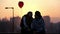 Young couple in love balloon heart valentine\'s day