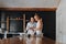 Young couple in love cook healthy food in the kitchen together