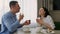 Young couple in love having fun breakfast in kitchen