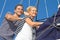 Young couple in love makes holiday on a sailboat