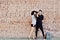 Young couple in love outdoor - full length portrait