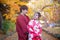 Young couple in love outdoor. Stunning sensual outdoor portrait of lover wearing japanese traditional kimono in autumn. love,
