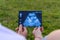 Young couple in love with a pregnant woman holds in their hands a picture of an ultrasound with an unborn baby