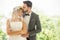 young couple in love Wedding Bride and groom kissing in the park. Newlyweds. Closeup portrait of a beautiful having a romantic