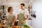 Young couple lover smile portrait is cooking in kitchen room at home.