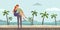 Young couple of lovers. Man and woman on a romantic date on a tropical beach with palm trees. A man carries a woman on