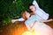 Young couple lying on the grass and relax, view from above