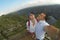 Young couple making selfie photo on the view point. Top of the hill and panorama of Canyon Uvac in Serbia