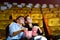Young couple people watching movie feeling scary and frightening at movie theater. In hand holding snack bucket and throw popcorn