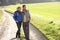 Young couple pose in park