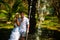 Young couple posing and in the foreground splashing fountain