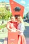 a young couple is posing for hours before the start of the 2018 FIFA World Cup and a soccer ball on Leningrad`s sunny day