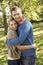 Young couple posing in park